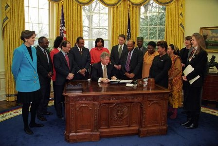 President Bill Clinton signs Executive Order