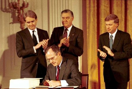 President George H. W. Bush signs the Clean Air Act Amendments